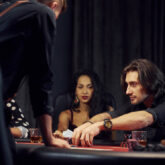 Group playing poker in